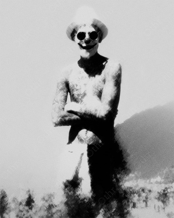Tattooed Clown Wearing Hat and Sunglasses Standing Shirtless in Harsh Sunlight – Grainy Monochrome