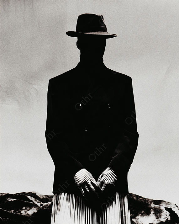 Silhouetted Figure in Hat and Pleated Outfit Standing Against Cloudy Sky and Rocky Landscape