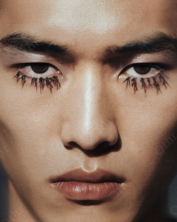 Close-Up Portrait of Man with Extensions on Lower Eyelashes