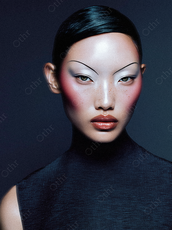 Studio Portrait of Woman With Futuristic Minimalism Makeup and Slicked-Back Hair