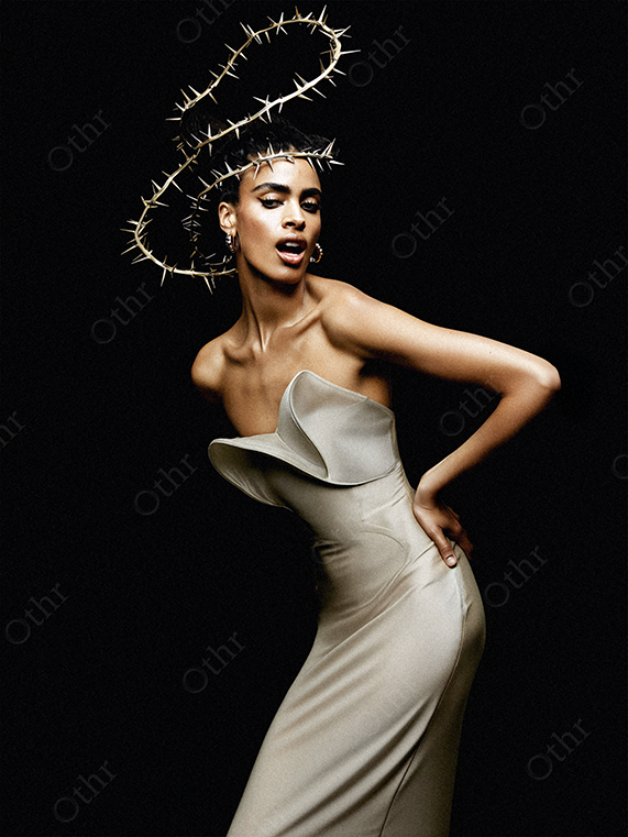 Fashion Portrait of a Person in Grey Strapless Dress With Spiral Thorn Headpiece