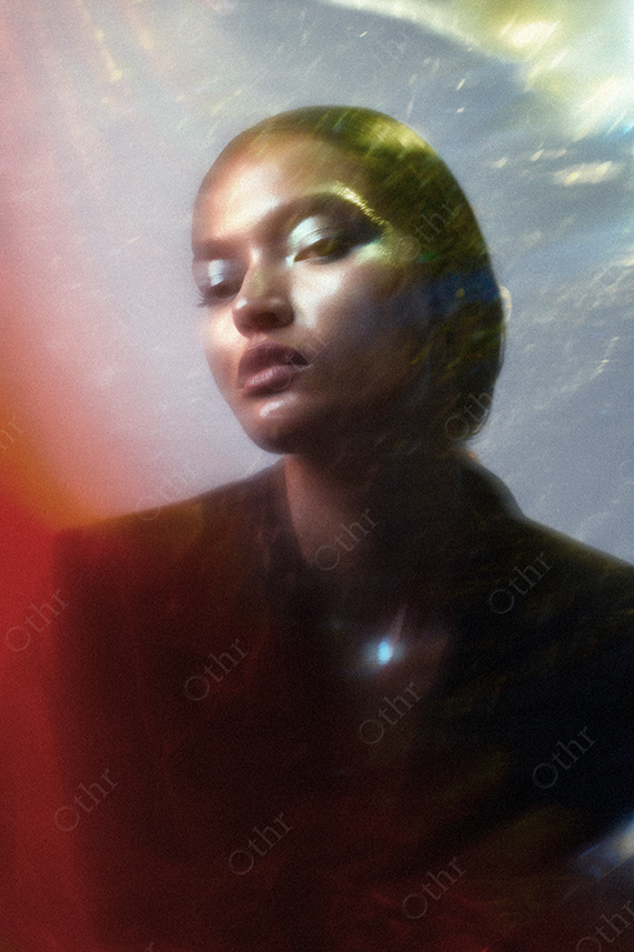 Dreamlike Portrait of a Person With Soft Focus Lighting and Colour Gradients