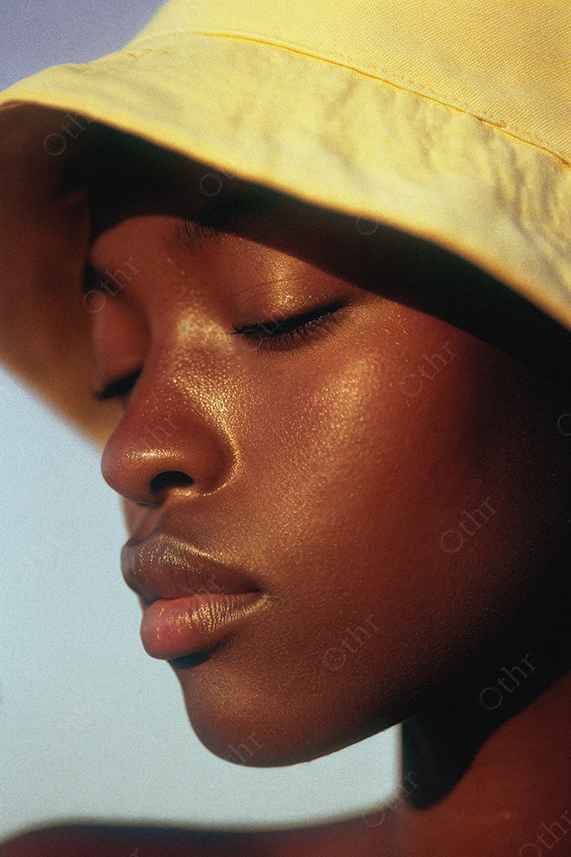 Close-Up Portrait of Woman in Yellow Hat With Eyes Closed