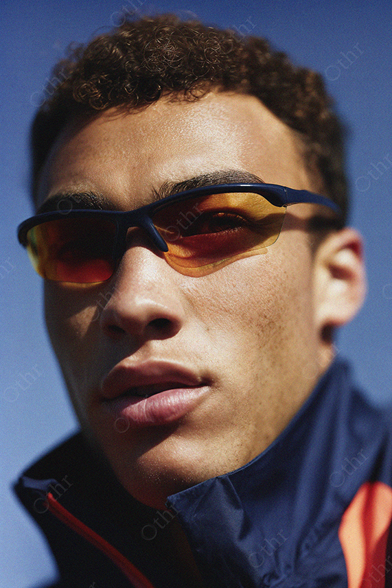 Close-Up Portrait of Man Wearing Sports Sunglasses and Jacket
