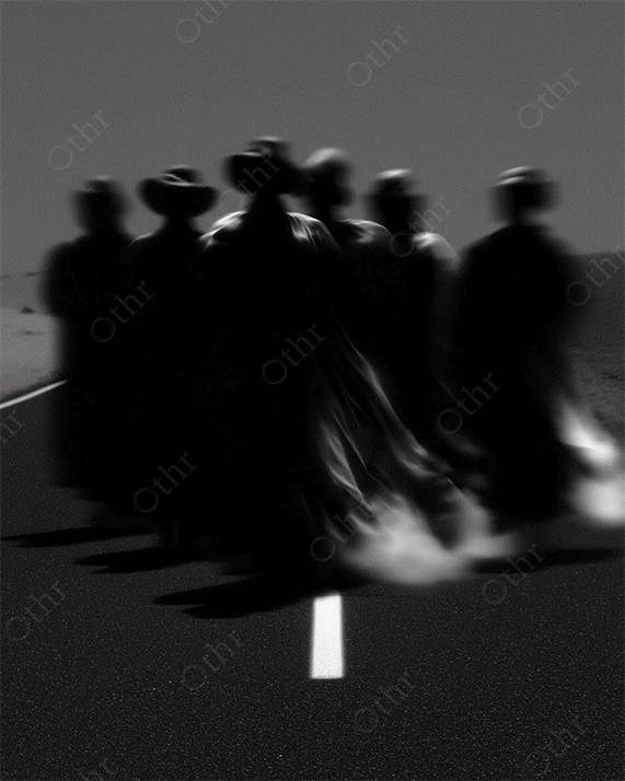 Monochrome figures crossing a desert road.