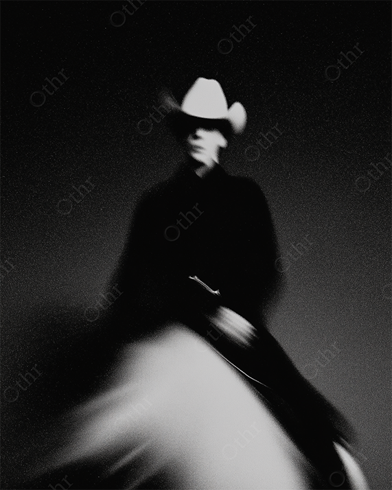 Monchrome Cowboy Riding Horse