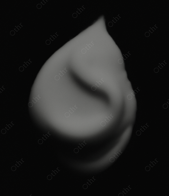 Monochrome White Cosmetic Cream on Black Background