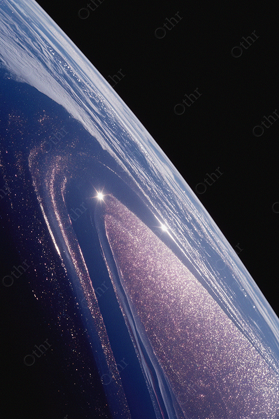 Iridescent glittery planet surface from space.