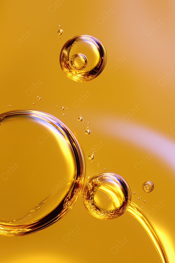 Close-Up of Golden Oil Bubbles