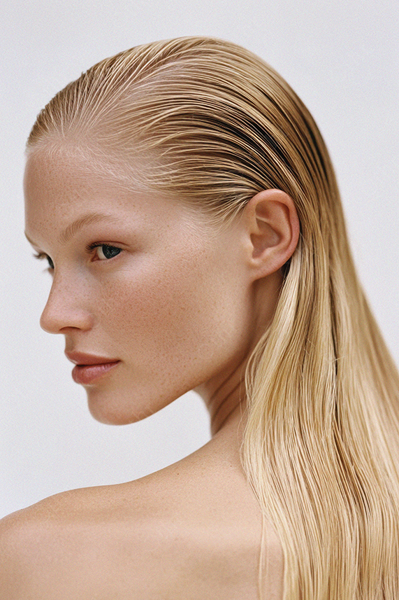 Profile View of Blonde Model with Wet Look Hair and Perfect Features