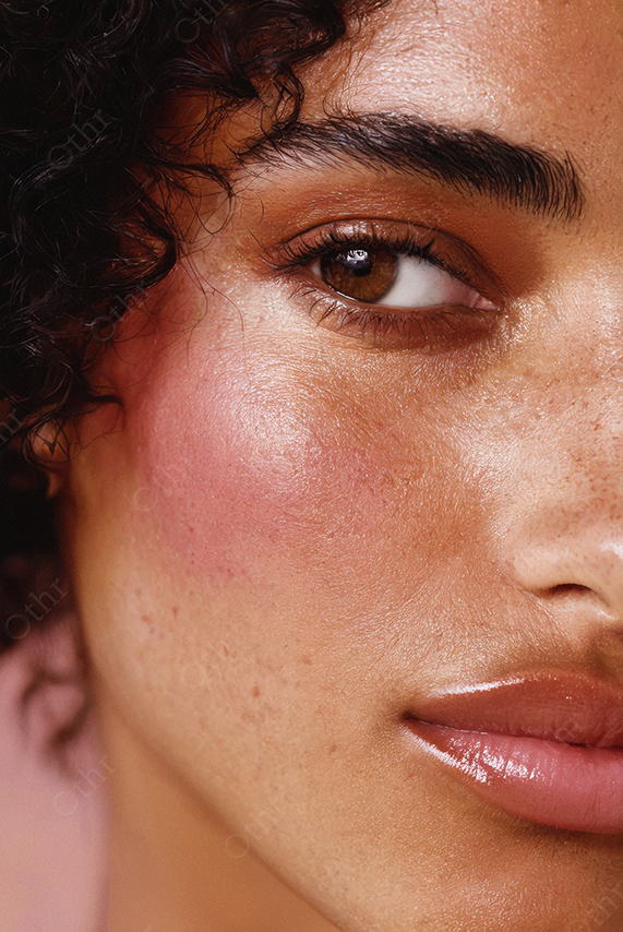 Close-Up of Persons Face with Natural Skin and Glossy Lips