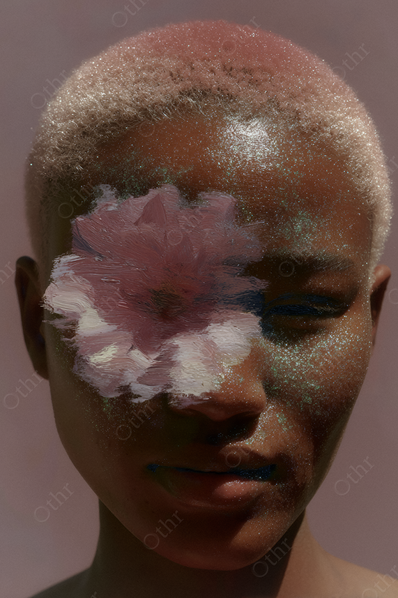 Close-Up Portrait of Woman with Painted Flower and Glittery Skin