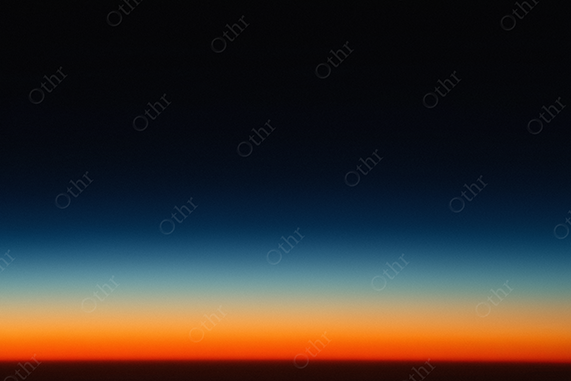 Gradient dawn sky — deep navy to orange tones in minimalist composition.