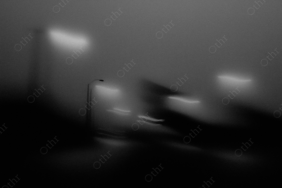 Black and white blurry street lights