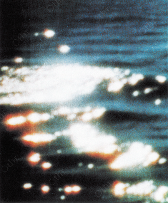 Vintage Image of Ocean Waves with Light Reflections