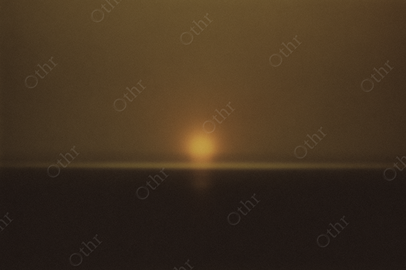 Grainy Sunset Over Calm Sea in Golden Haze