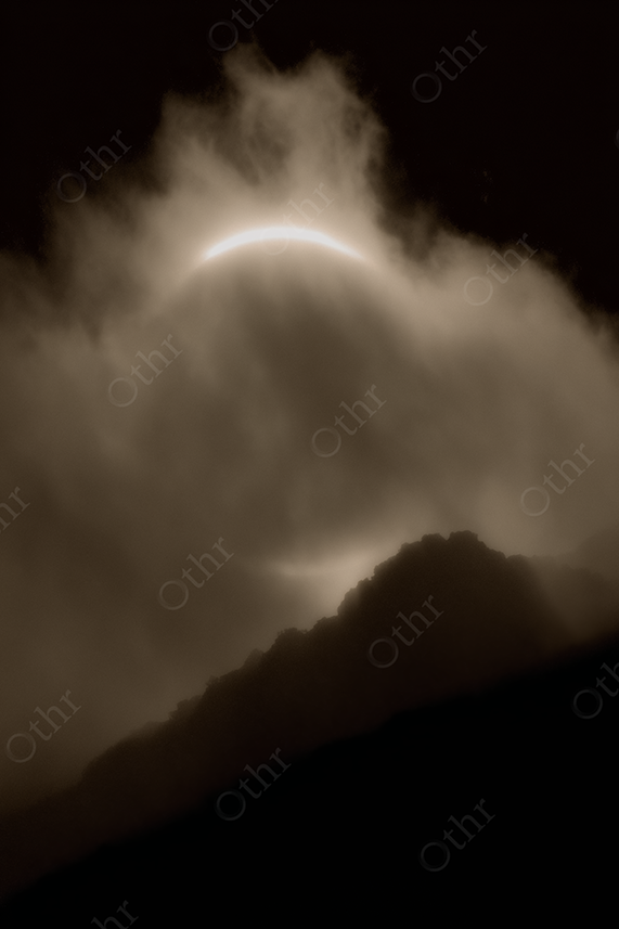 Solar Eclipse Ring Over Sharp Mountain Peak