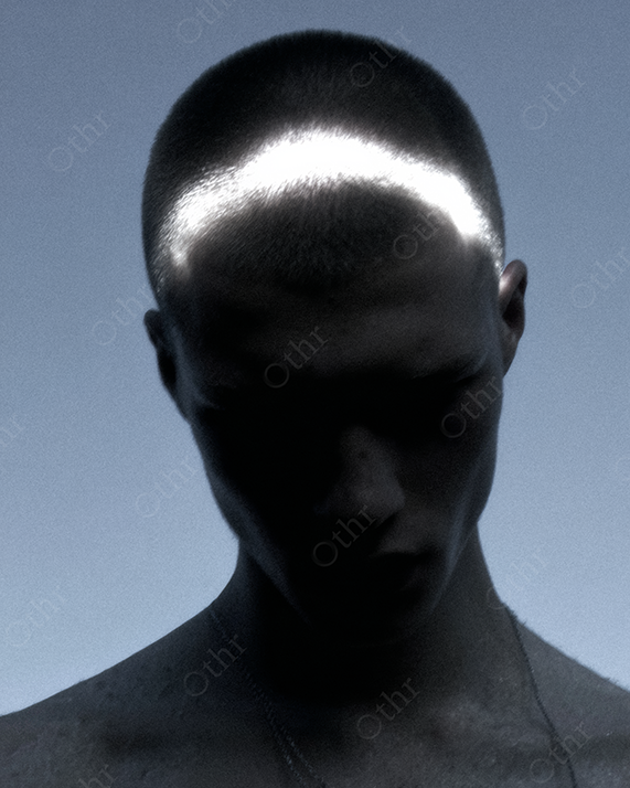 Shadowed Portrait with Light Band Across Scalp