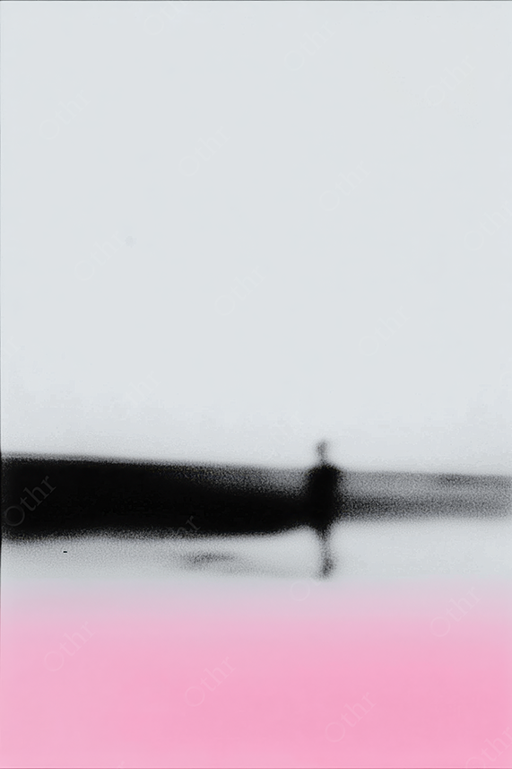 Minimalist Silhouette of a Person Standing by Water With Pink Reflection on Horizon