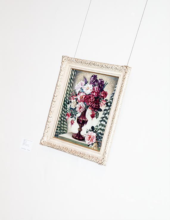 Framed Floral Painting Hanging Slightly Tilted on a Gallery Wall