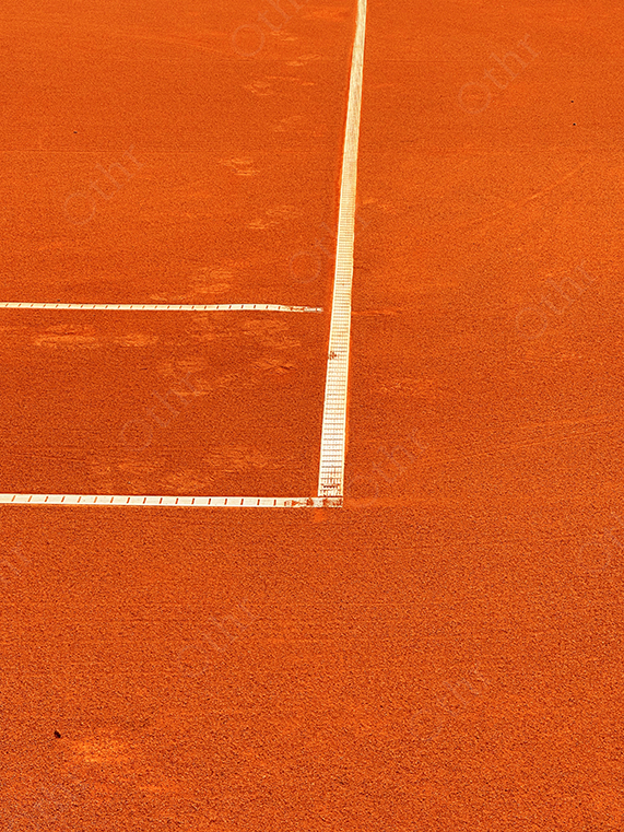 Clay Tennis Court Lines in Bright Sunlight