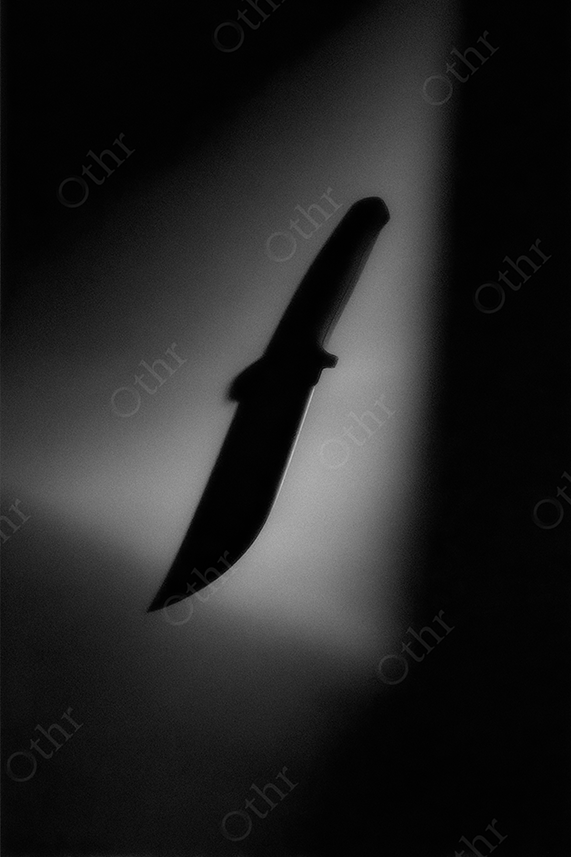 Knife Silhouette Cast Against Soft Directional Light