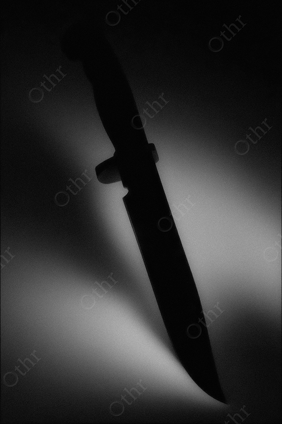 Knife Silhouette Cast Against Soft Directional Light