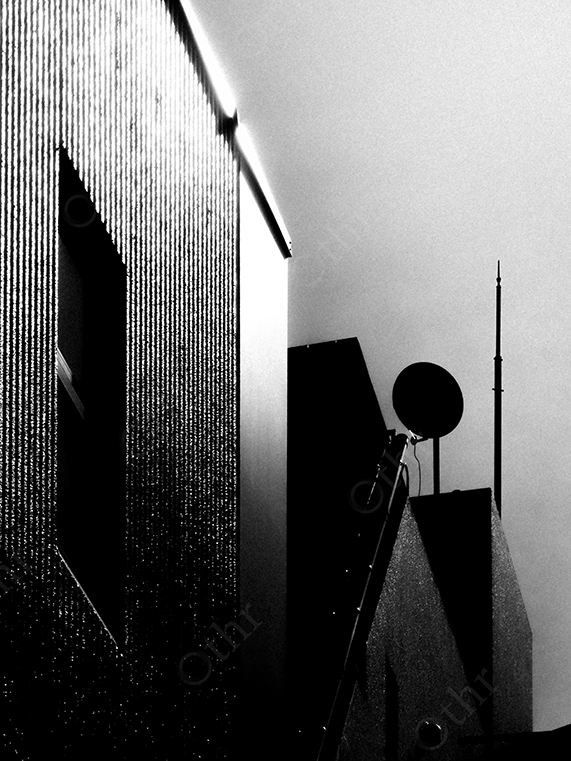 High-Contrast Monochrome Silhouettes of Urban Buildings and Antennas