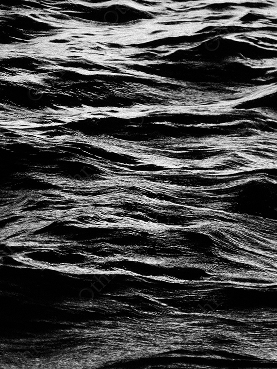 Black and White Close-Up of Textured Ocean Waves