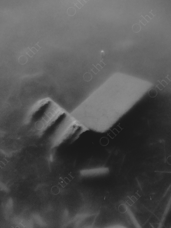 Abstract Monochrome View of a Submerged Object in Murky Water