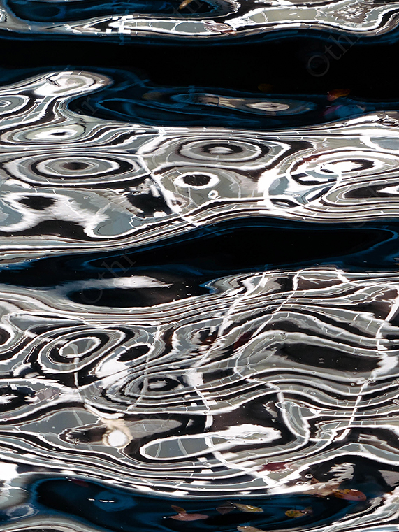 Abstract Reflections on Rippling Water Surface