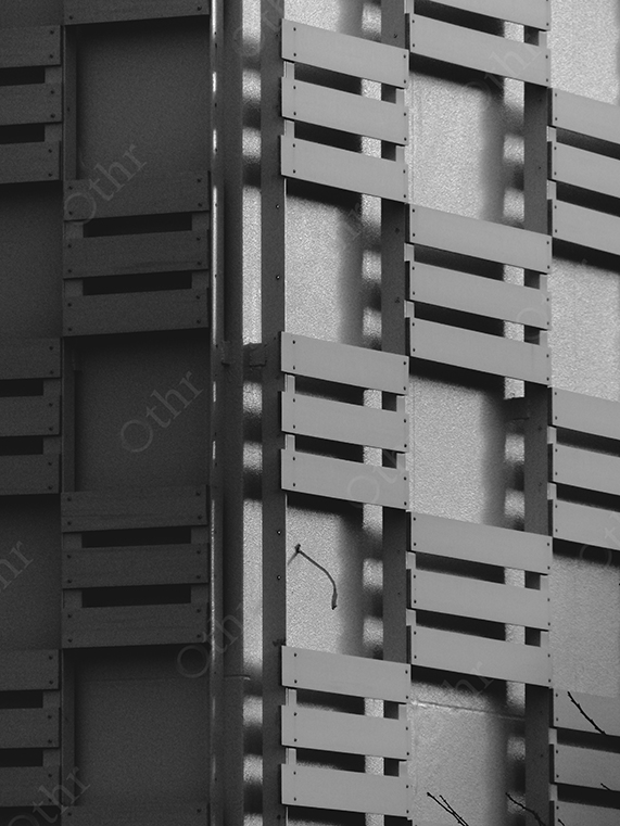 Black and White Architectural Facade With Repeating Slatted Panels
