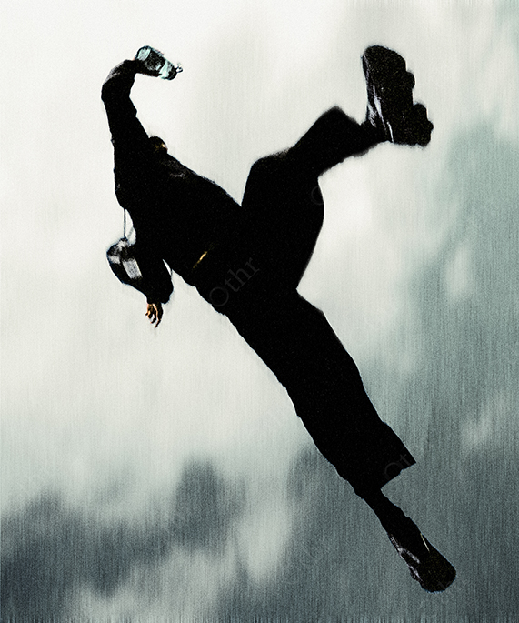Blurred Figure in Mid-Air Jump Against Textured Grey Background With Strong Motion Blur