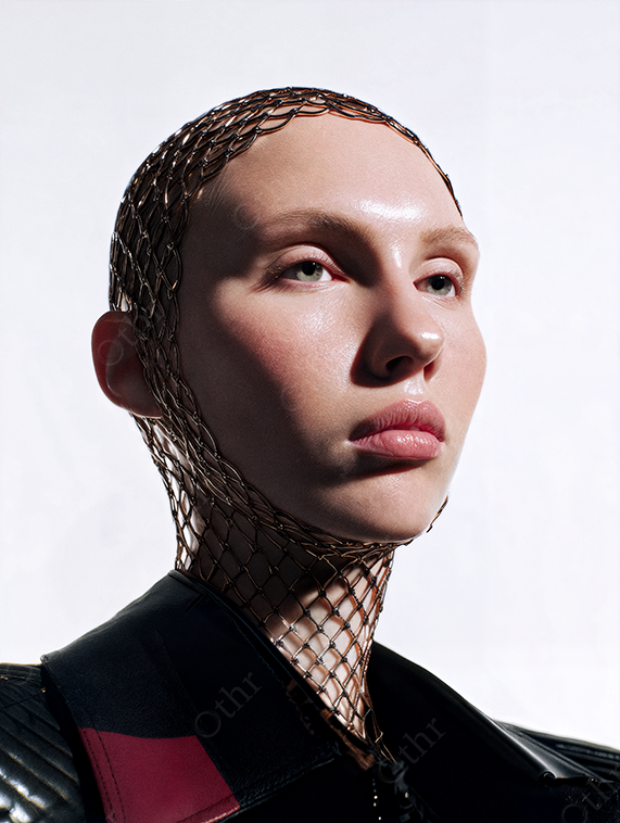 Studio Portrait of Person with Mesh Head Covering