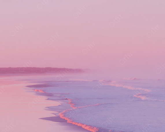 Serene pastel ocean view with pink and purple dreamy colours.
