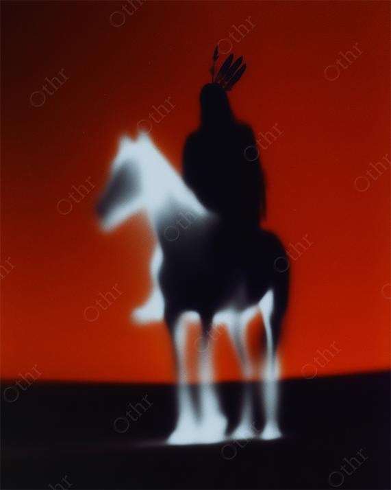 Native American on horseback with a black and red background.