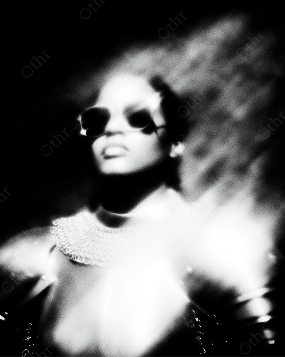 Futurist female portrait with armor and glasses