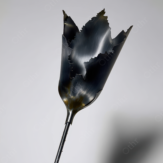 Charred black metal petal bloom
