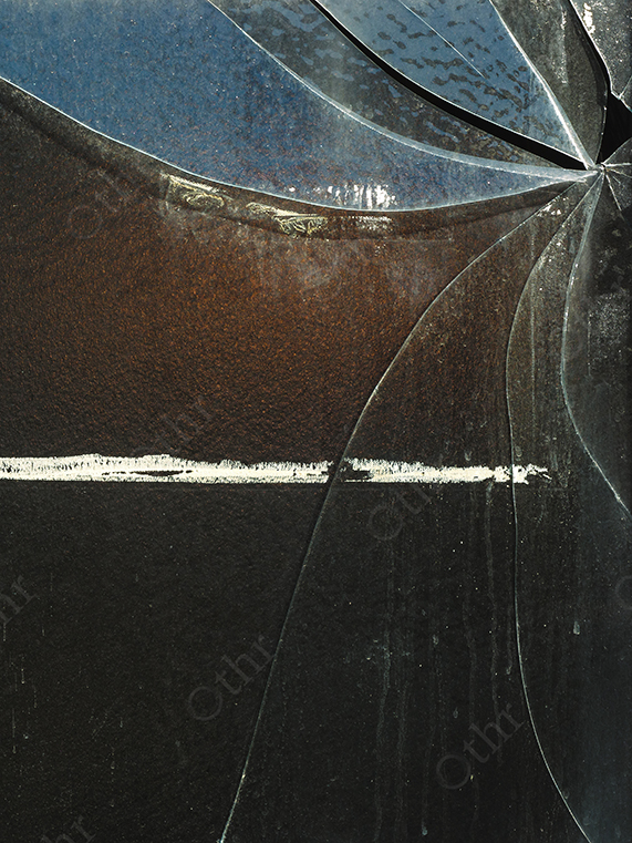 Cracked Glass Pattern Over Rusted Metal Surface with Curved Fracture Lines