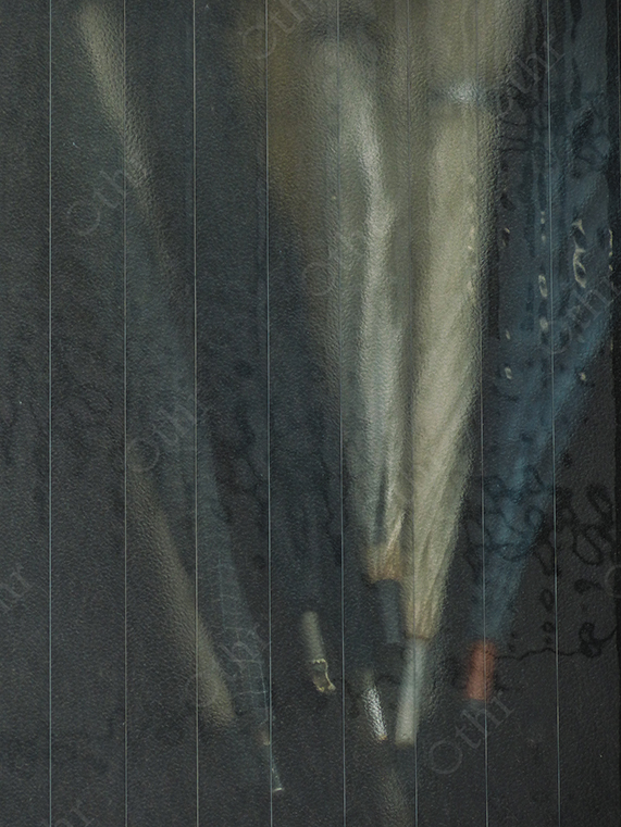 Blurred Objects Behind Ribbed Textured Glass with Vertical Line Pattern