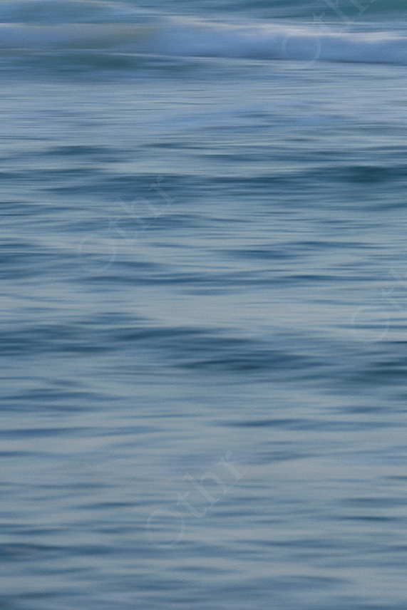 Abstract Motion Blur of Blue Water Surface Creating Soft Horizontal Texture